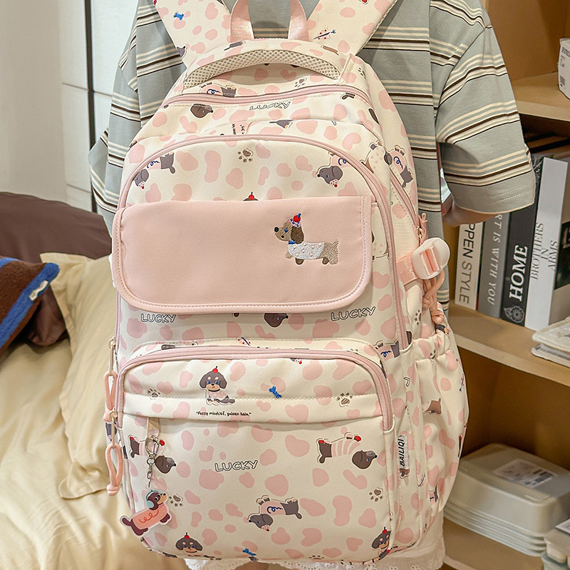 A new high-appearance-level Japanese ins fresh, sweet and cute dog backpack, a lightweight and large-capacity backpack for junior and senior high school students details Picture