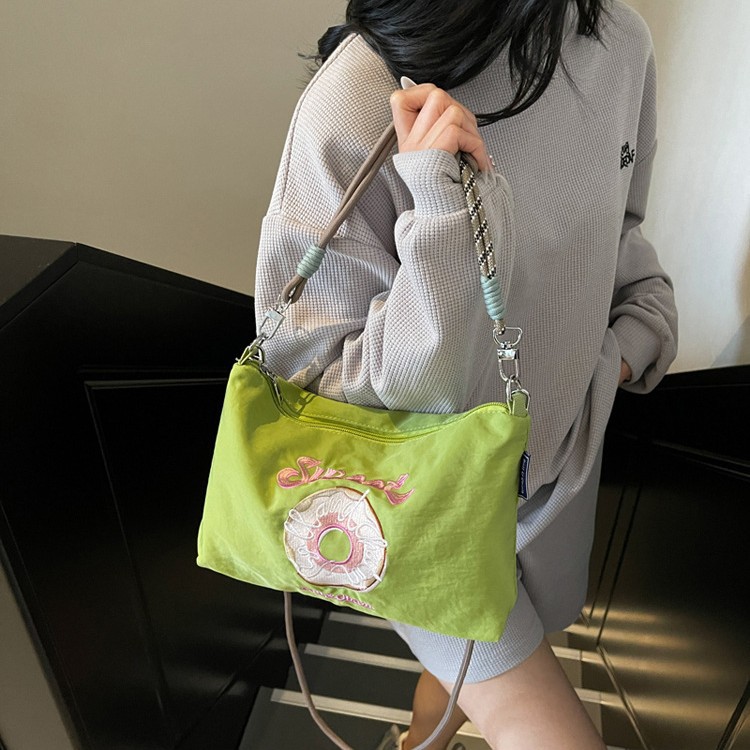 Summer new small shoulder bag with high appearance level, heavy embroidery donut nylon bag, women's casual and versatile shoulder bag full figure