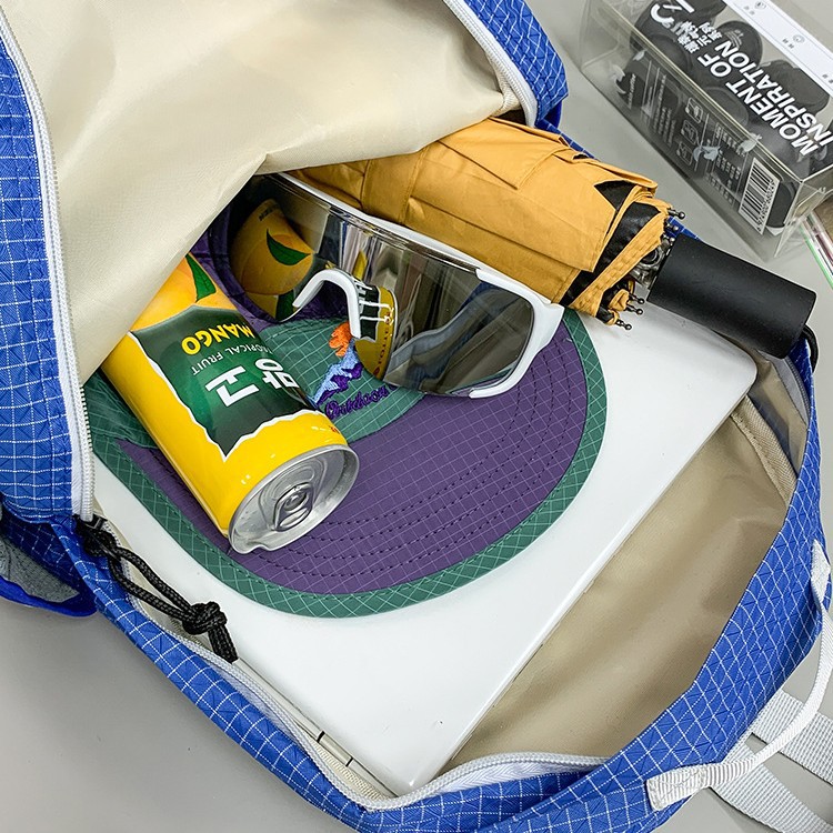 A new high-appeal color-blocking drawstring letter backpack for both men and women, a light and fresh backpack for junior and senior high school students to commute Application Scenario
