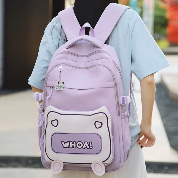 A new Japanese-style ins school-style backpack with a fresh and sweet color contrast and splicing design, a lightweight spring outing backpack for junior and senior high school students full figure