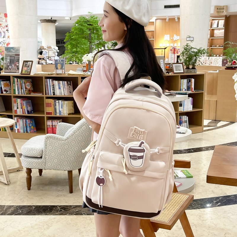 A new high aesthetic level, sweet and cute schoolbag with a college style, a casual, simple, lightweight and versatile backpack for junior and senior high school students details Picture