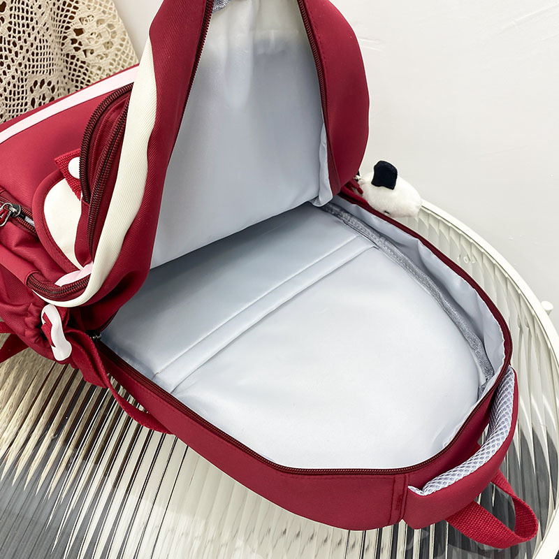 Wide-shoulder strap schoolbag for female junior high school students, large capacity, fresh and cute. Two-piece backpack set for primary school students from grades three to six Application Scenario
