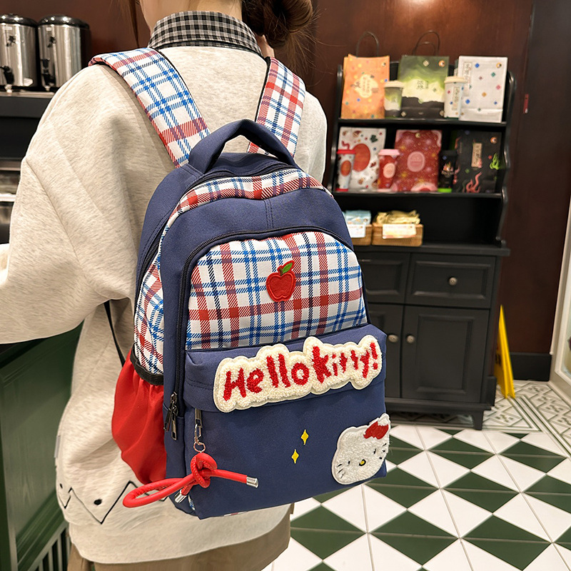 American retro checkered backpack, niche and cute cartoon KT cat backpack, large-capacity student schoolbag, casual backpack full figure