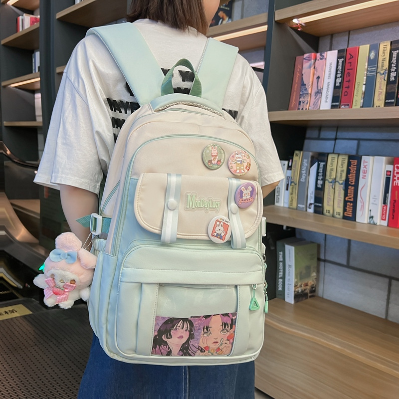 This large-capacity backpack is a new Japanese style with a high level of appearance. It has a fresh, sweet and cute school style. It's a cute bag for junior and senior high school students full figure