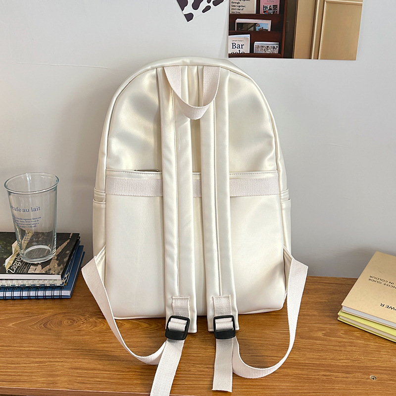 Bag Girl 2025 New solid color simple backpack, large-capacity PU lightweight travel backpack for junior and senior high school students Specification drawing