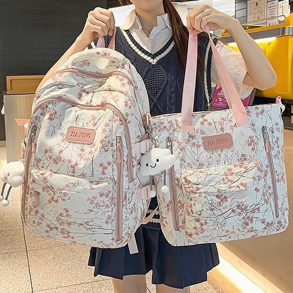A new Chinese-style backpack with a high level of appearance, fresh and sweet. It is a lightweight and large-capacity backpack for junior and senior high school students full figure