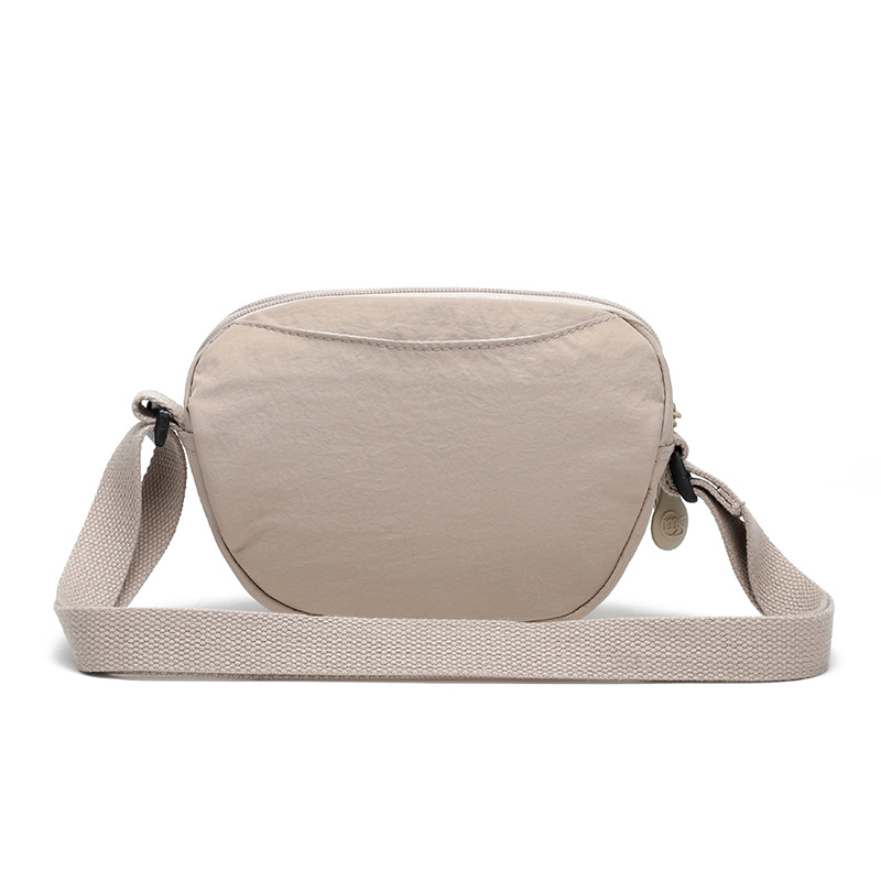 The 2025 new style of fashionable and versatile commuter single-shoulder bag, simple multi-compartment backpack, high appearance level, casual solid color crossbody bag Specification drawing