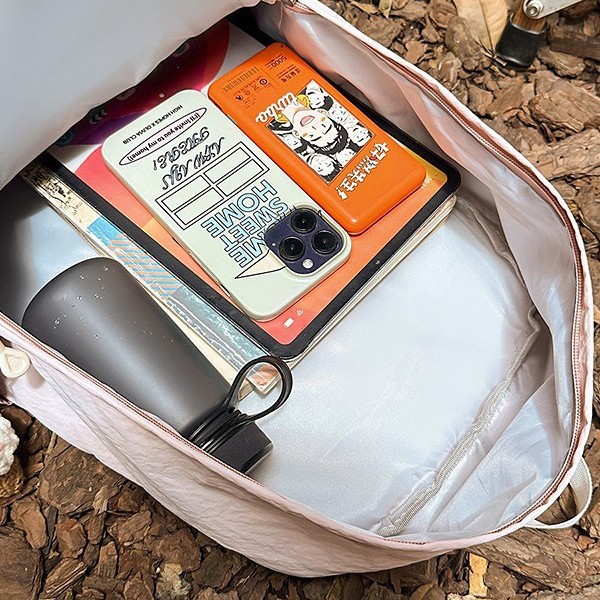 A new high-appearance-level forest-themed ins fresh and simple color-blocking backpack with a large capacity for women's lightweight travel Application Scenario
