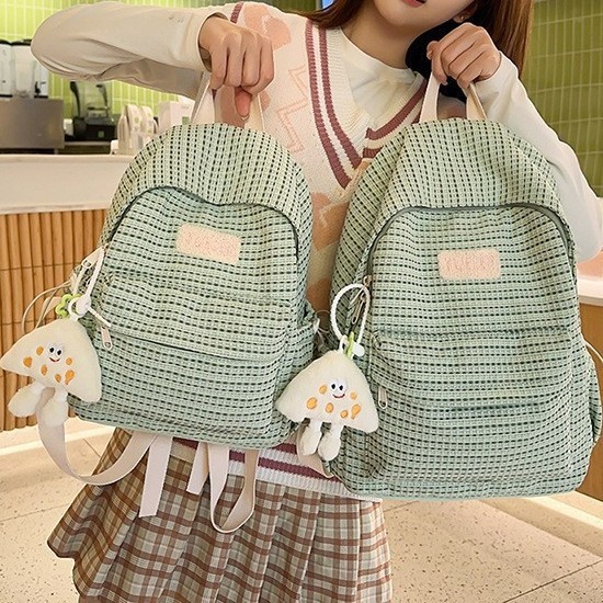 The new Korean version of the forest-themed ins high-appearance-level fresh and sweet striped backpack is a versatile large-capacity backpack for high school students details Picture