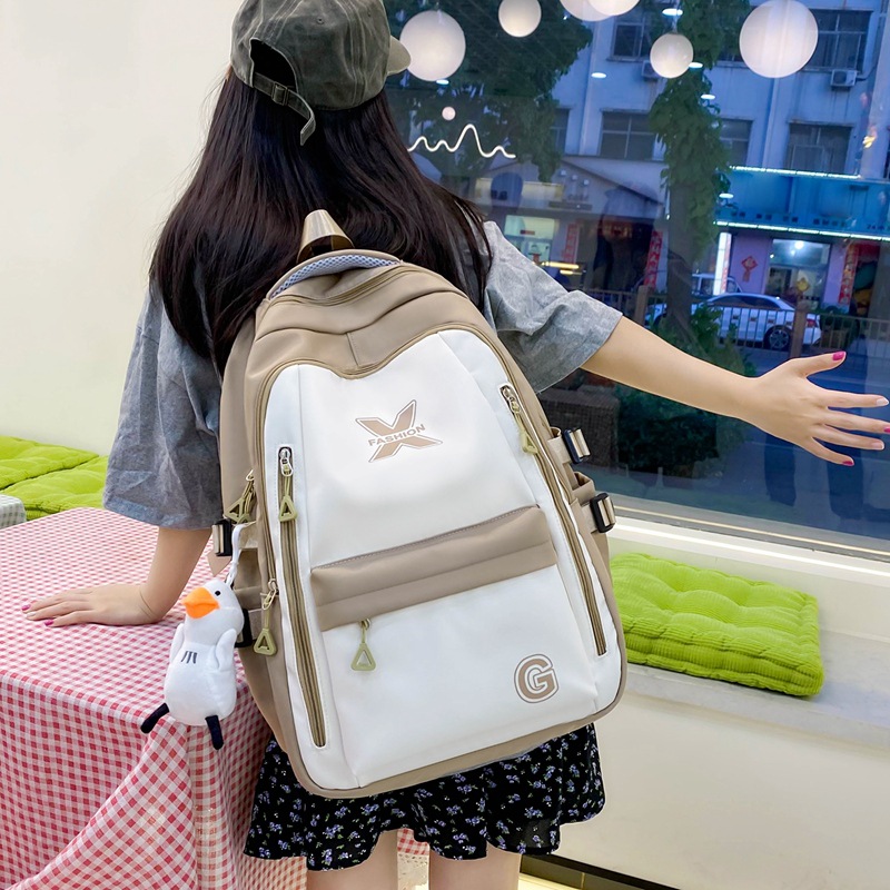 Wholesale of new large-capacity junior high school and senior high school schoolbags, female college student computer backpacks, simple and dirt-resistant casual backpacks details Picture
