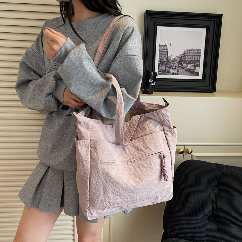A new Japanese-style commuter forest-themed artistic large-capacity tote bag, a casual, simple and versatile commuter crossbody bag for women details Picture
