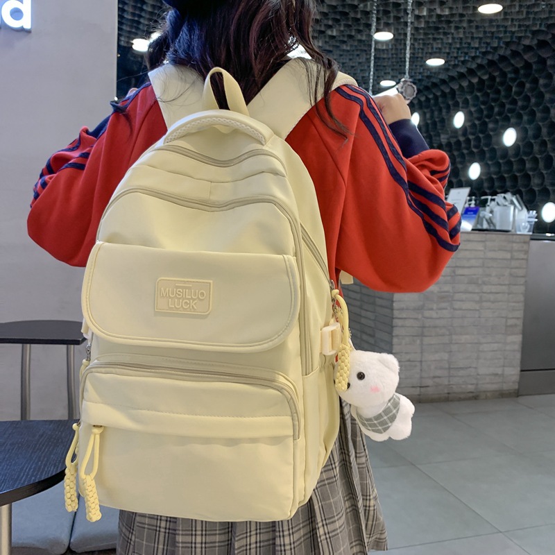 Japanese-style ins backpack with a large capacity and multiple compartments, lightweight middle school backpack and college student travel backpack details Picture