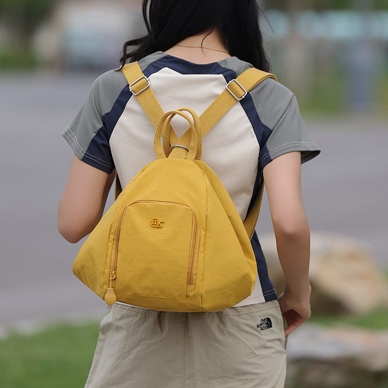 A new women's casual backpack with a forest style, ins solid color, three-in-one, simple and lightweight travel and mountaineering backpack details Picture