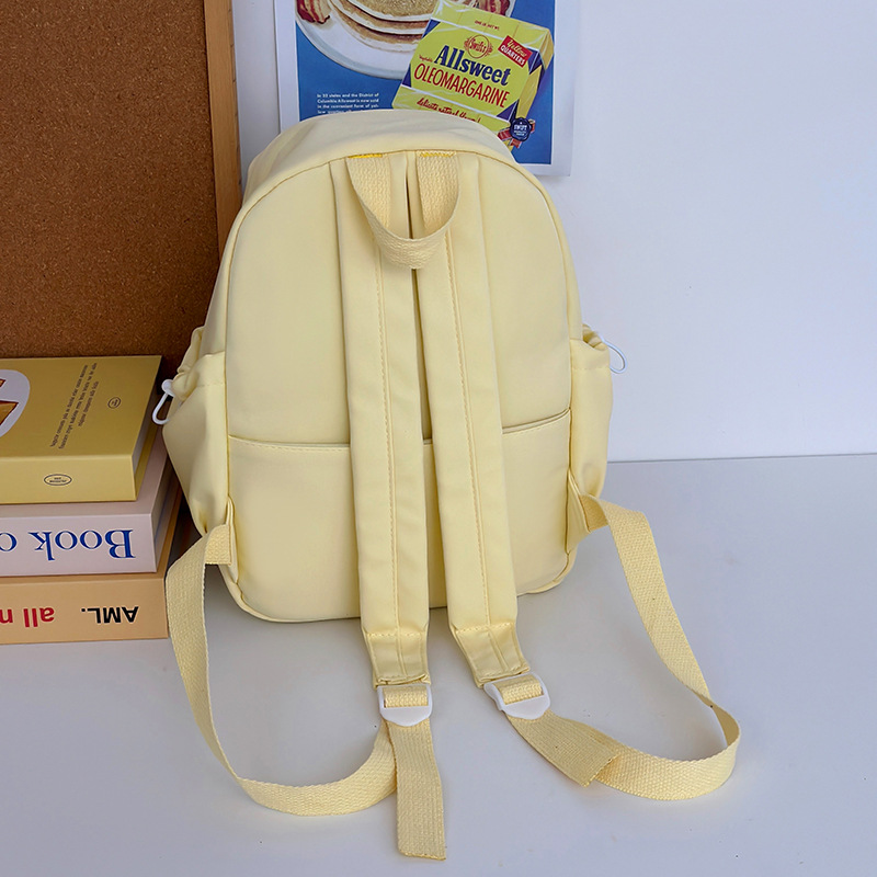 The 2024 new style of fresh and clean mini backpack is versatile. It's a small schoolbag for college students, a commuter bag for women, a mom bag, and a travel backpack Application Scenario