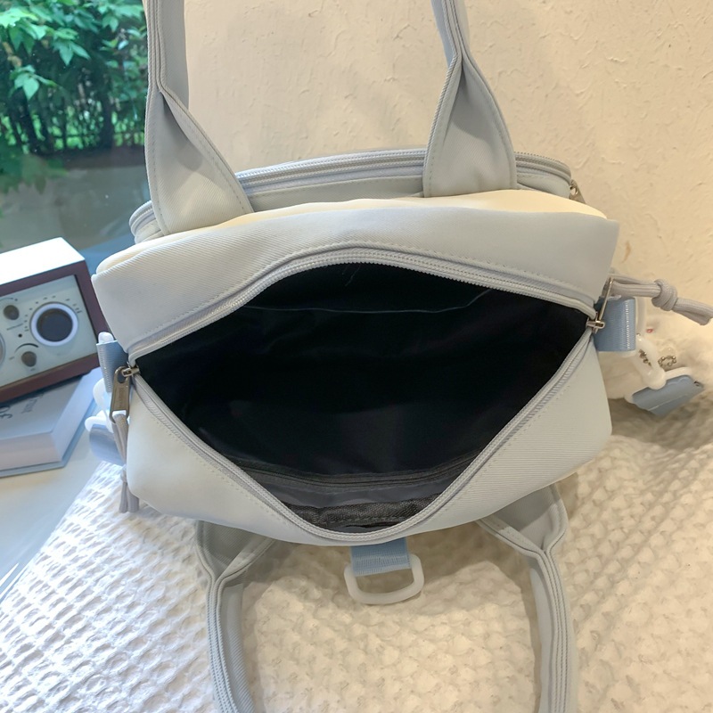 2024 New Japanese-style cute sporty transparent crossbody bag, women's fashion versatile, high appearance level backpack, hand-held pain bag Application Scenario