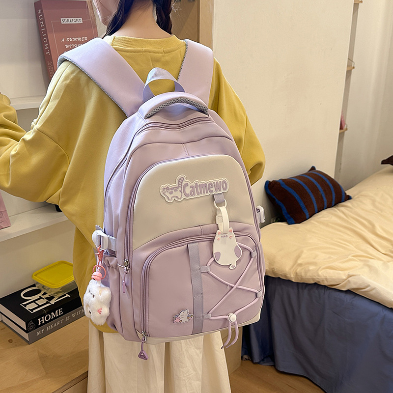 The school-style, color-blocking Japanese-style Instagram backpack for junior and senior high school students is lightweight, versatile, and a niche backpack with a fresh and sweet look full figure