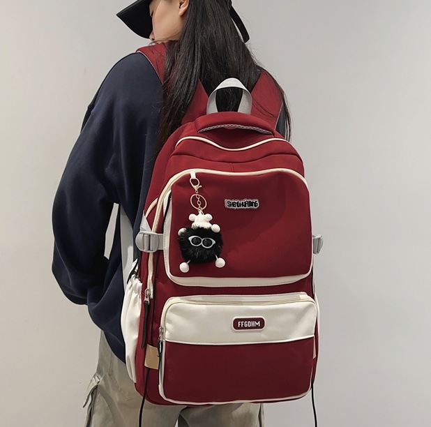 Couple schoolbags, large-capacity lightweight backpacks for junior high school students, high-quality color-blocking backpacks for primary school students in grades four to six full figure