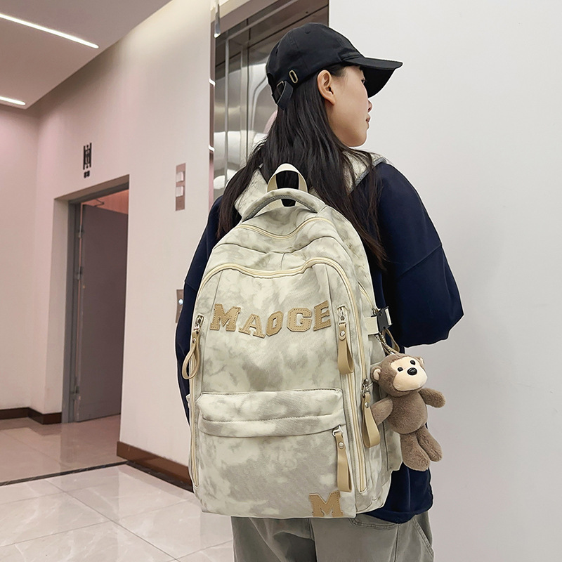 2025 New high-appearance-level middle school backpack with large capacity, Korean version of ins college style couple casual travel backpack details Picture