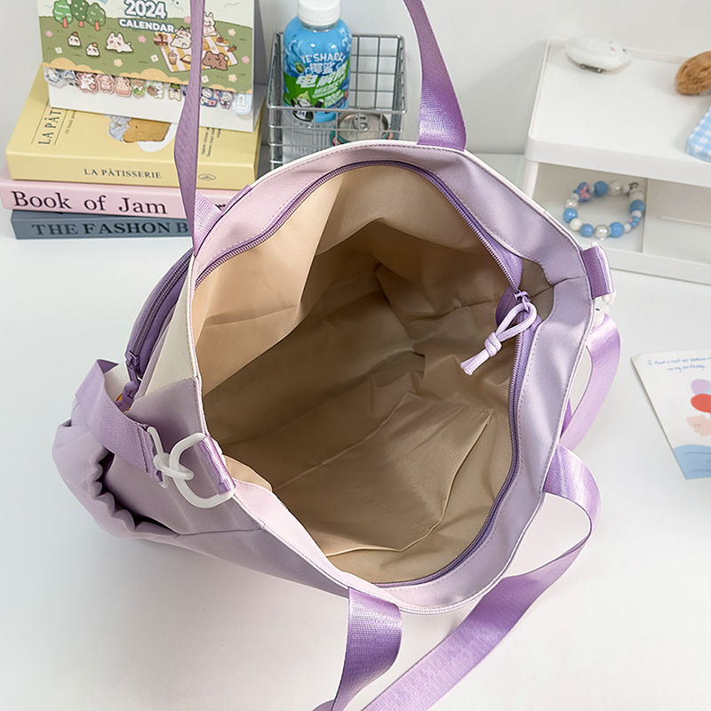 Large-capacity school-style single-shoulder bag for female primary school students to carry books for class tutoring. High appearance level and cute star-shaped crossbody bag Application Scenario