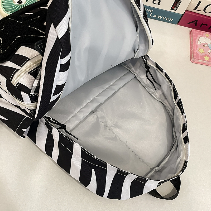 High appearance level, niche design, hot girl schoolbag, versatile, star and zebra pattern cute girl backpack, college student backpack Application Scenario