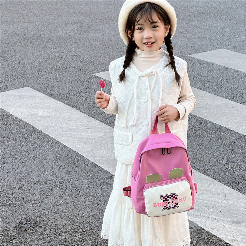 Trendy children's fashionable color-blocking backpacks, ultra-light backpacks for boys and girls traveling, cool and versatile small schoolbags details Picture
