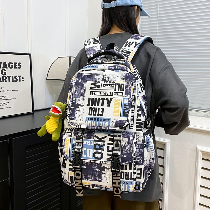 "Men's 2025 New style personalized graffiti middle school backpack, Japanese trendy brand college student couple travel backpack. details Picture