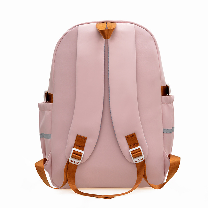 A lightweight and large-capacity backpack for women, a new Japanese style backpack with a high level of appearance and a college style, featuring multiple layers and cute cartoon bear designs Specification drawing