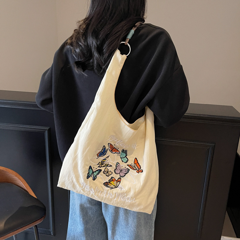 A new Japanese-style fashionable embroidered shopping bag, a large-capacity versatile handbag, a casual and lightweight shoulder bag for commuting and students details Picture