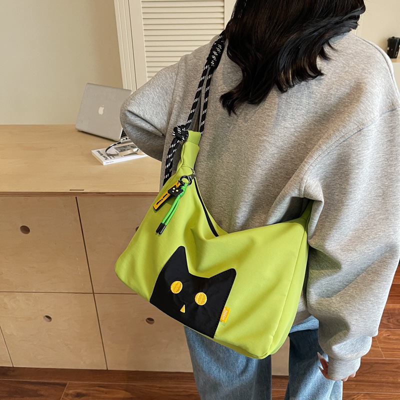 The new Japanese-style cute cat tote bag with a high-end feel is a casual, simple, lightweight and versatile crossbody bag for commuting full figure