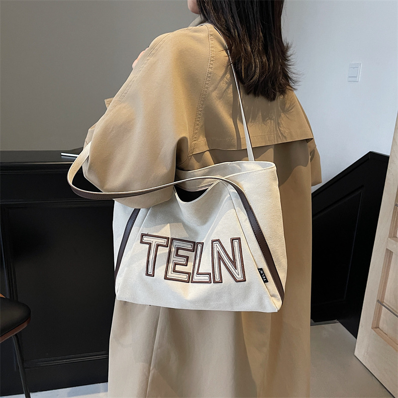 Large-capacity canvas tote bag for women, 2025 new style casual single-shoulder bag, large bag for school commuting, and handbag for going out details Picture