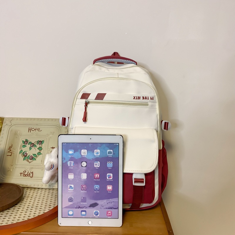 New junior high school student schoolbag in solid color with a college style, large-capacity backpack, high school student backpack for girls Application Scenario