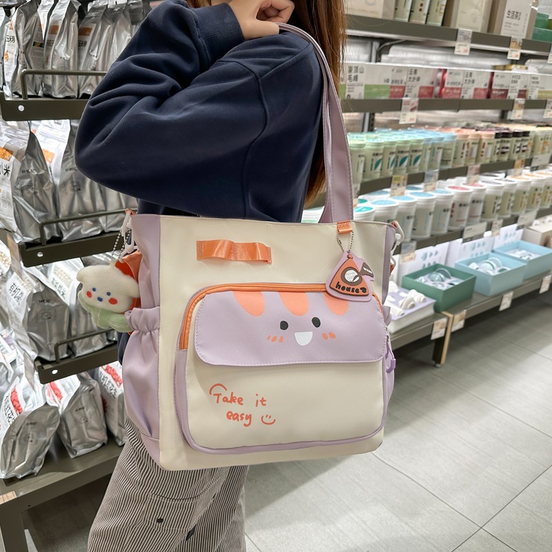 2025 New cute large-capacity tutorial bag, primary school single-shoulder bag, handbag, tutorial bag, crossbody art schoolbag details Picture