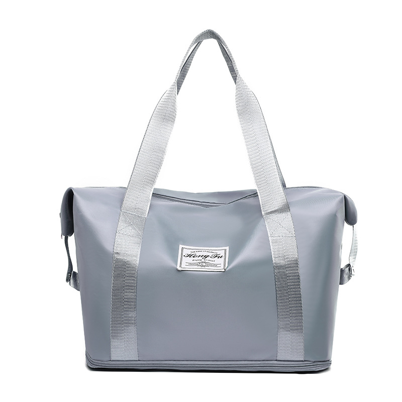 Hand-held large-capacity casual travel bag, waterproof Oxford fabric convenient fitness bag, multi-functional single-shoulder maternity storage bag Item Picture