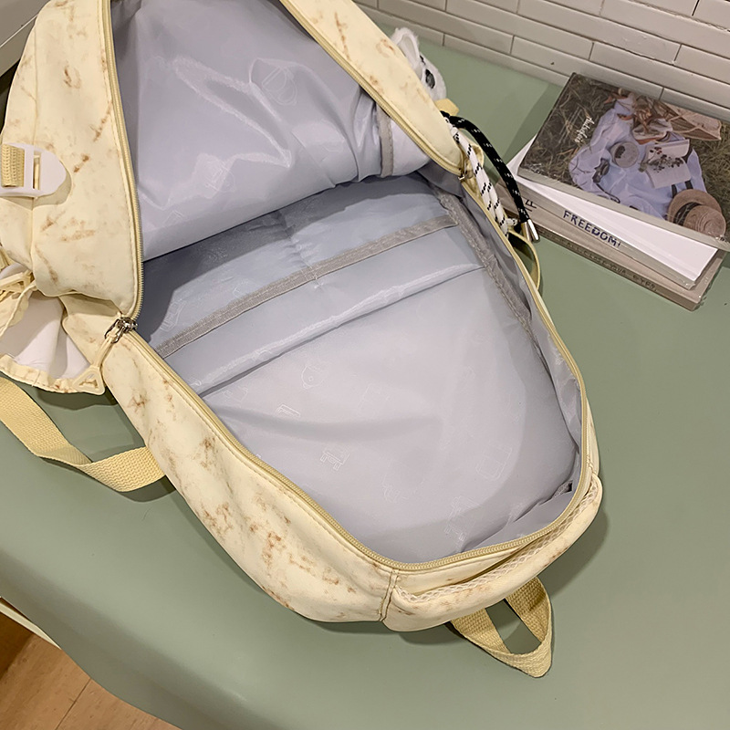 The new summer tie-dyed artistic Chinese-style schoolbag has a high appearance level. It is a light and refreshing travel backpack for young girls with a forest style Application Scenario