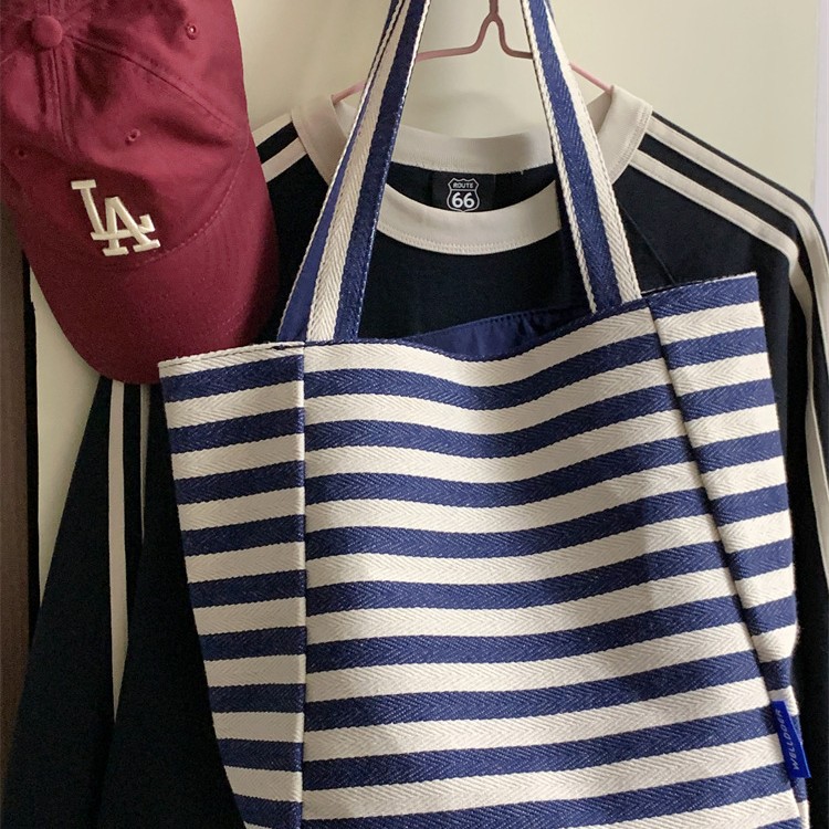 Striped forest style, high appearance level, country style, fashionable double-sided tote bag, French exquisite, large-capacity student single-shoulder bag Application Scenario