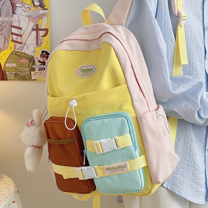 New high-appearation-level college style color-blocking backpack, a versatile large-capacity backpack for junior and senior high school students for casual, light and commuting full figure