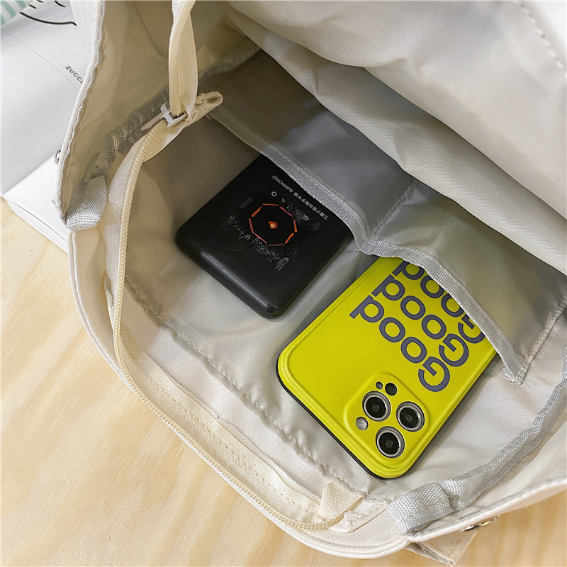 A new minimalist backpack with a Korean niche design, a versatile travel backpack, and a lightweight, color-blocking, large-capacity student schoolbag Application Scenario