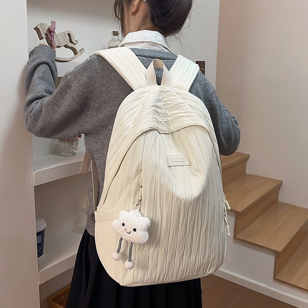 A new large-capacity solid-color, simple and versatile school-style backpack from Japanese ins, a travel backpack for junior and senior high school students full figure