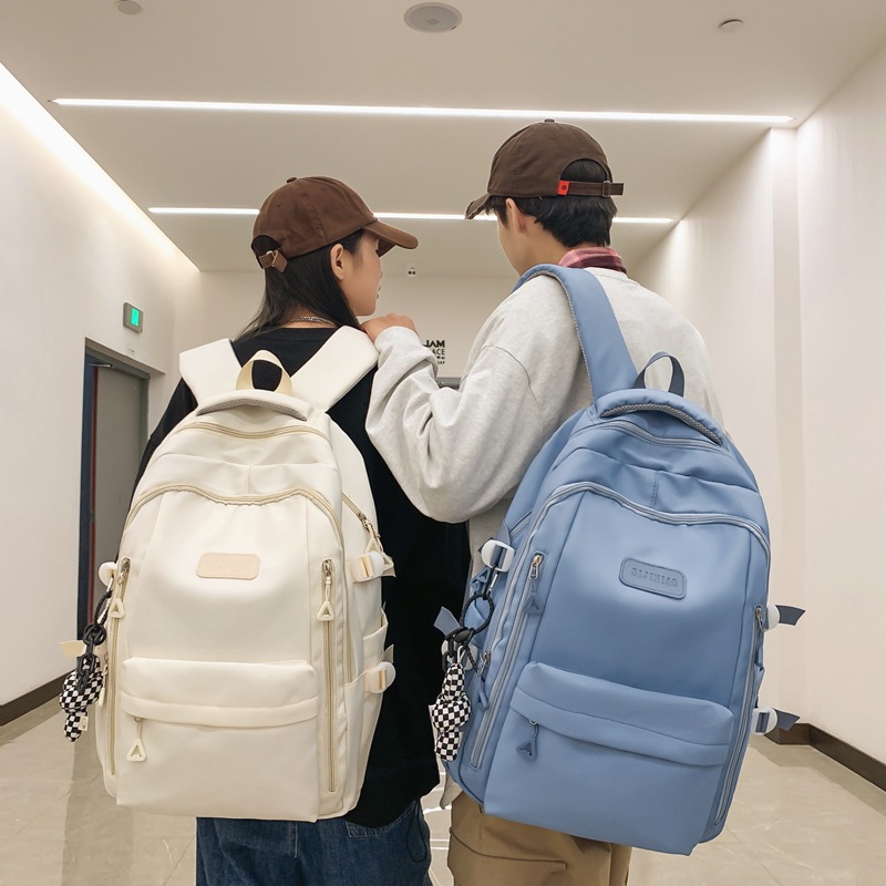 The 2023 new Korean-style ins college student couple backpack is lightweight and simple, a backpack for junior and senior high school students details Picture