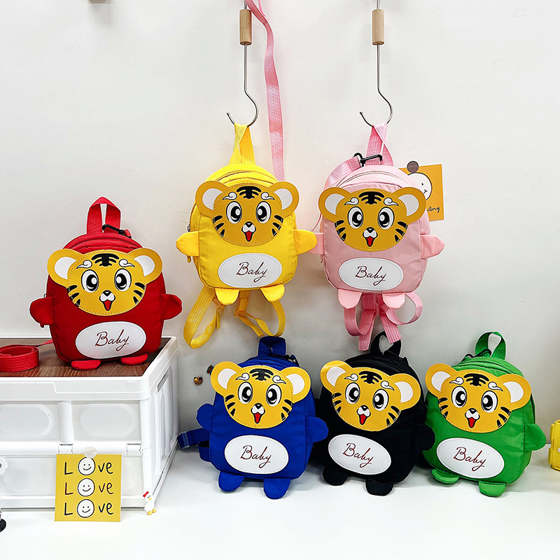 A cute cartoon tiger-shaped backpack for children to prevent getting lost, a lightweight and fashionable baby backpack, and a kindergarten schoolbag full figure