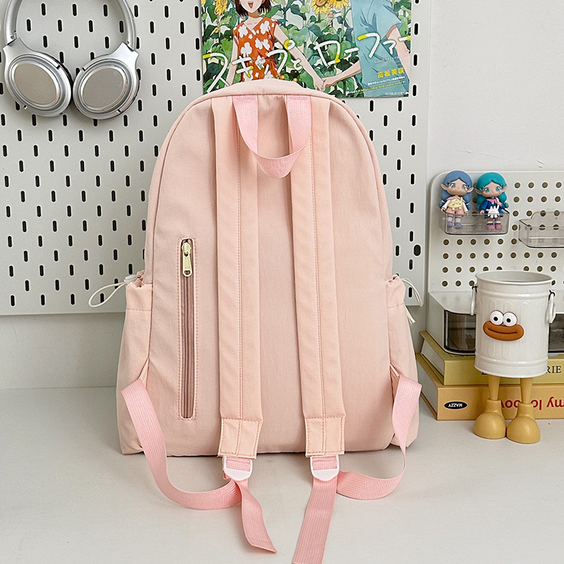 A new Japanese-style ins fresh and sweet color-blocking backpack, a casual, lightweight and large-capacity backpack for junior and senior high school students Specification drawing