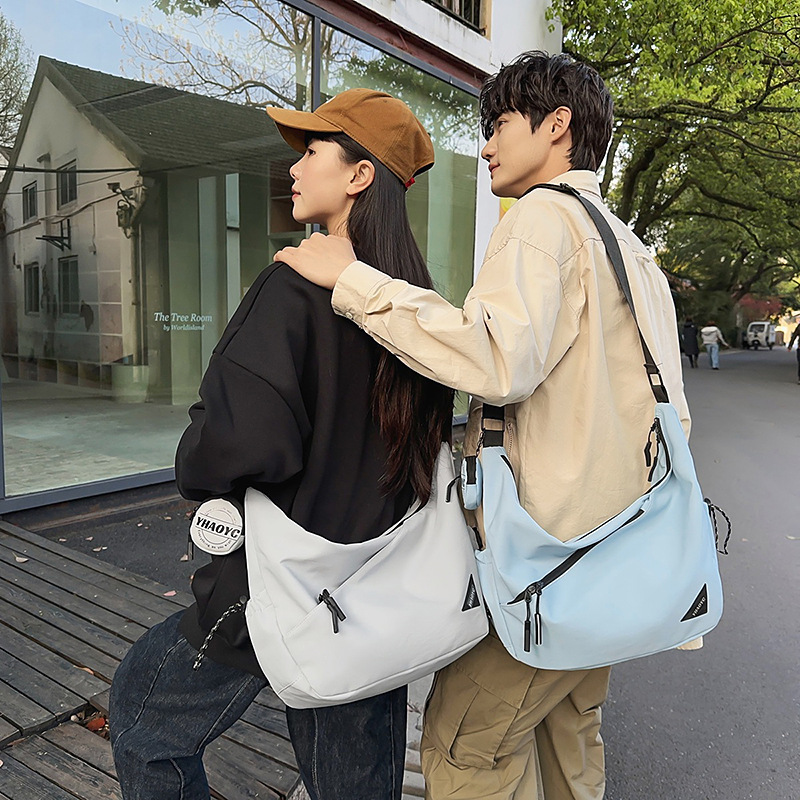 Couple crossbody bags, casual large-capacity trendy brand dumpling bags, versatile workwear single-shoulder bags, sporty and laid-back style niche bags details Picture
