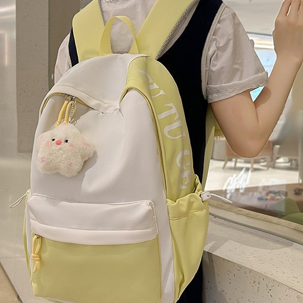 A new Japanese Instagram backpack with a high level of appearance, fresh and sweet, featuring color-blocking and splicing for women. It is lightweight and has a large capacity for spring outings details Picture