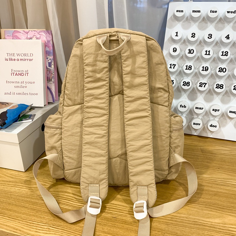 A new minimalist backpack with a Korean niche design, versatile travel backpack, lightweight solid color and large capacity student schoolbag Specification drawing