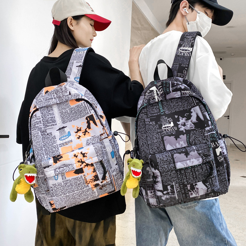 A new Korean version of Instagram, with a high level of appearance, personalized graffiti, trendy and cool backpacks, couple color contrast, simple and large-capacity backpacks full figure