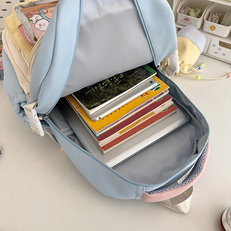 A new high-appearance-level Japanese ins school style fresh and sweet backpack for junior and senior high school students with color-blocking and patchwork backpacks Application Scenario