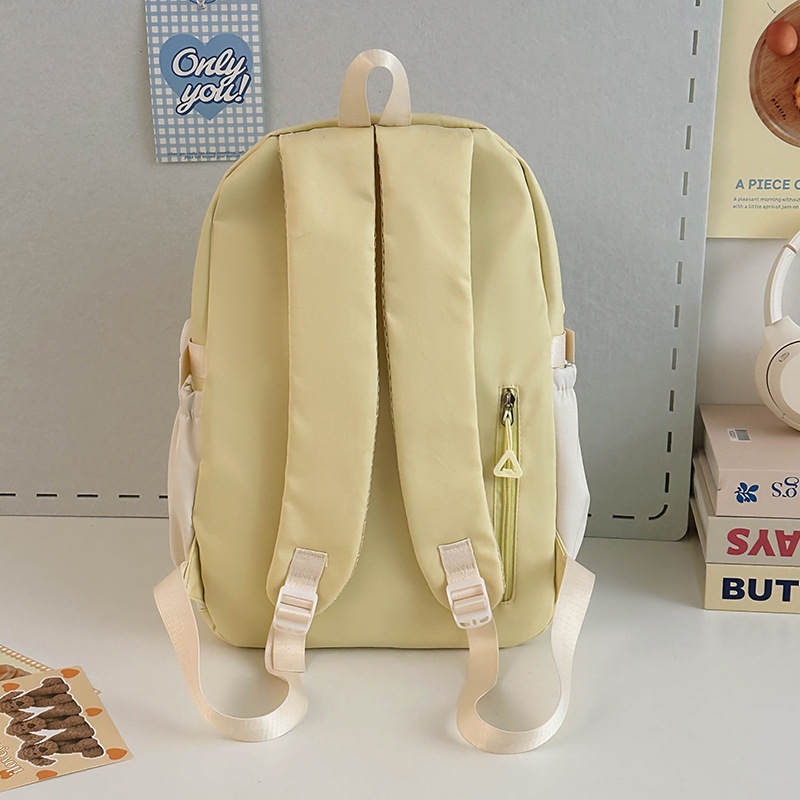 Cream-style campus junior and senior high school schoolbags, versatile large-capacity color-blocking casual backrest bags, travel and outings backpacks Specification drawing