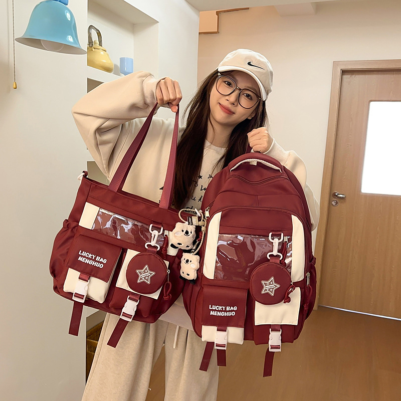 A new high-appearance-level, college-style ins tutorial bag with color-blocking and multi-layered two-piece backpacks for junior and senior high school students details Picture
