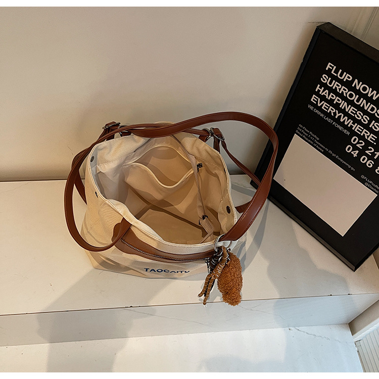2025 New stylish and versatile canvas tote bag, large-capacity school commuting backpack, casual and simple backpack Specification drawing