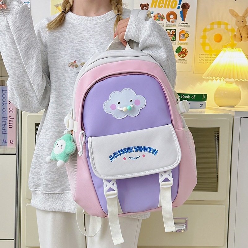 A new high-appearance-level school-style ins fresh and sweet color-blocking and patchwork backpack, a lightweight backpack for junior and senior high school students full figure